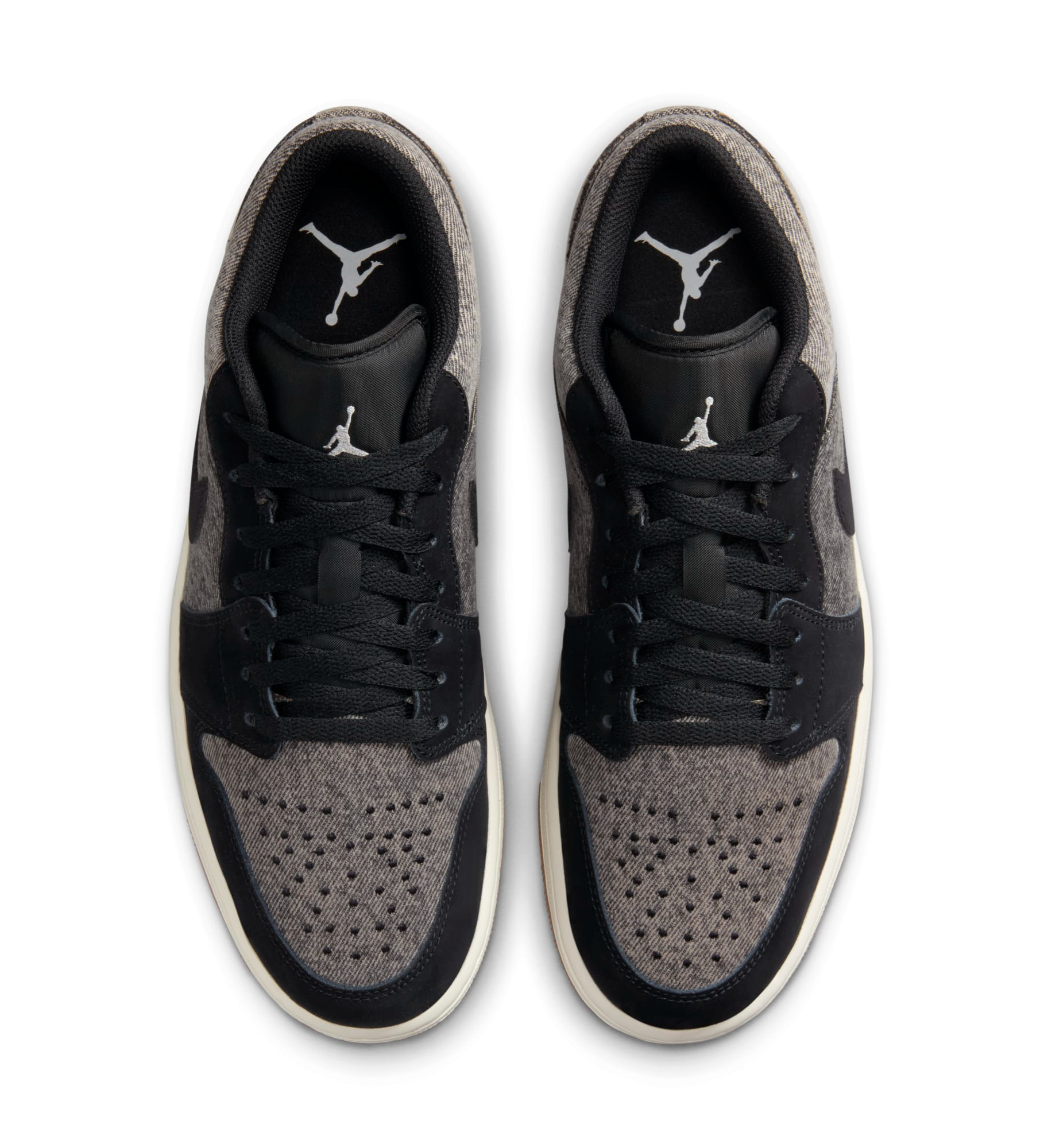 The Air Jordan 1 Low Surfaces In Black Denim and Gum Brown